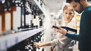 Couple buying wine - Cartwright’s Market